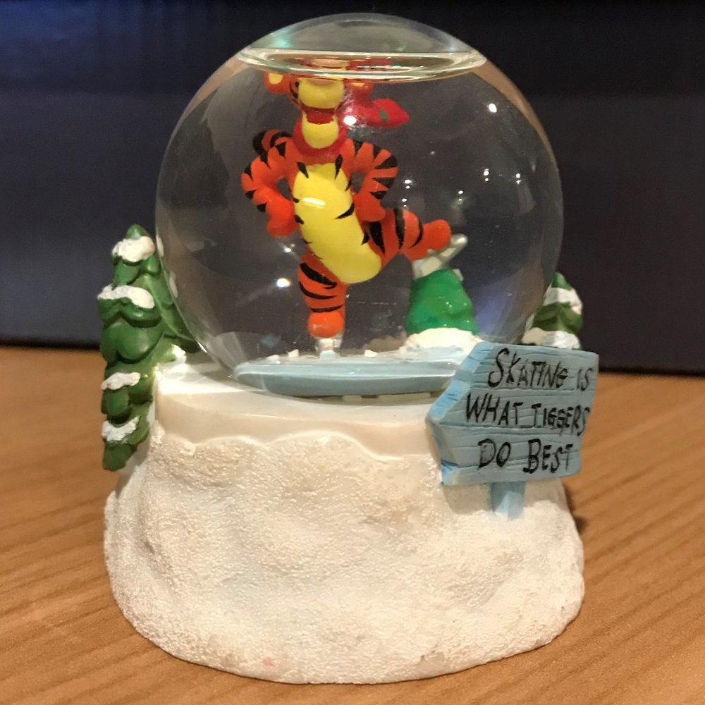 A TIGGER SKATING SNOWGLOBE FROM WDW